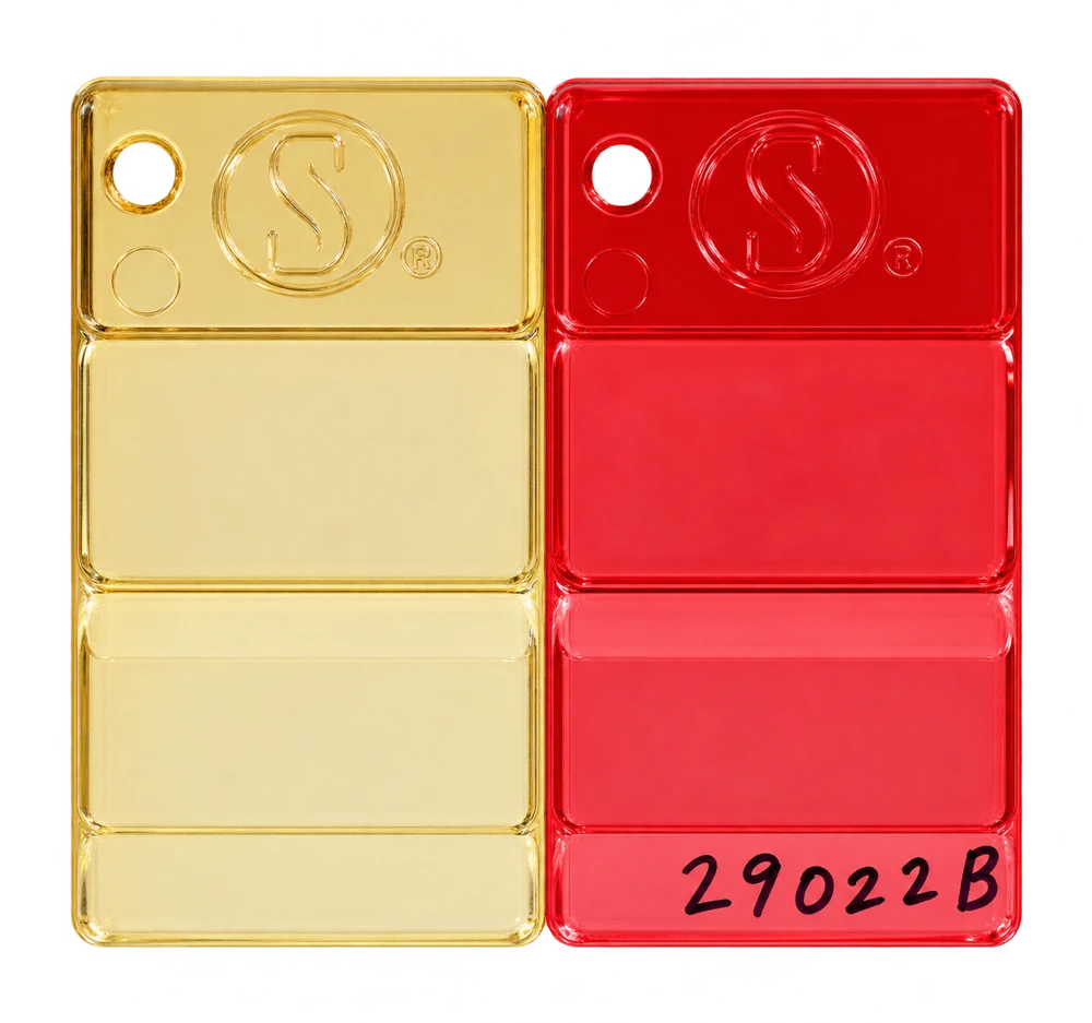 PC masterbatch samples: Pale Amber, Transparent Red — 29022B